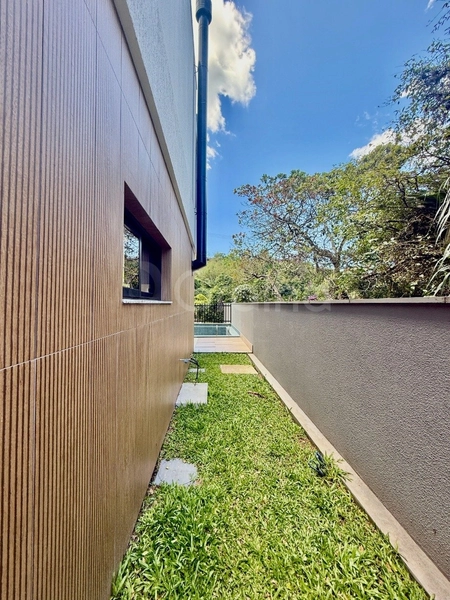 Casa com 3 suítes no Cacupé: 27ª foto da galeria de imagens do imóvel