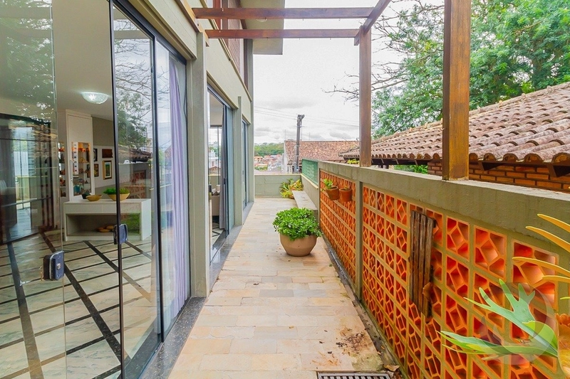 Casa com 4 dormitórios na Agronômica: 14ª foto da galeria de imagens do imóvel