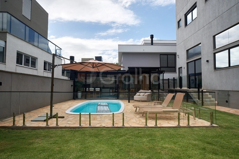 Casa em condomínio fechado com 3 suítes no Itacorubi: 1ª foto da galeria de imagens do imóvel