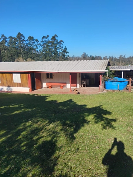 Chácara em Maquiné com porteira fechada.: 4ª foto da galeria de imagens do imóvel