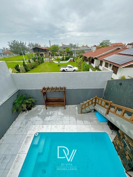 Casa de 03 dormitórios com piscina aquecida: 2ª foto da galeria de imagens do imóvel