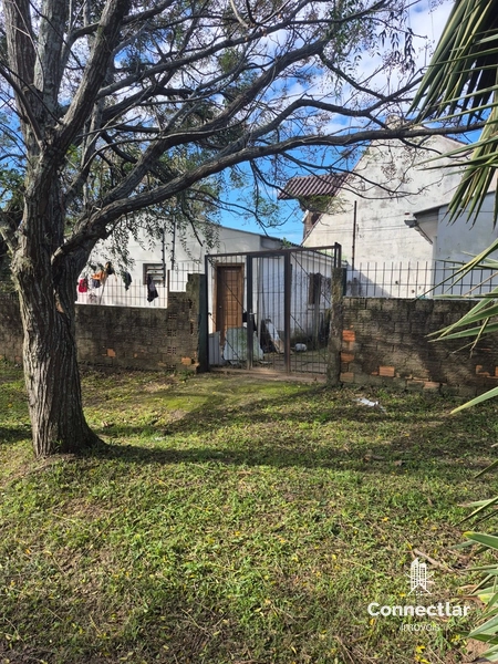 TERRENO COM 3 CASAS: 2ª foto da galeria de imagens do imóvel