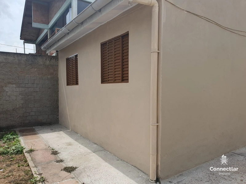 TERRENO COM 3 CASAS: 1ª foto da galeria de imagens do imóvel