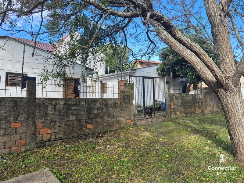 TERRENO COM 3 CASAS: 3ª foto da galeria de imagens do imóvel