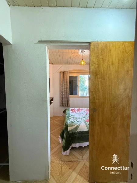CASA AMPLA COM PARTE DA FRENTE PARA POSSÍVEL COMÉRCIO.: 8ª foto da galeria de imagens do imóvel