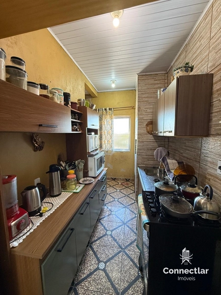 CASA AMPLA COM PARTE DA FRENTE PARA POSSÍVEL COMÉRCIO.: 5ª foto da galeria de imagens do imóvel