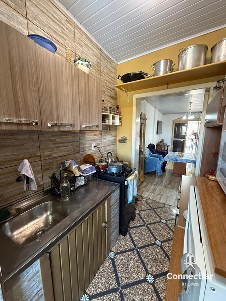 CASA AMPLA COM PARTE DA FRENTE PARA POSSÍVEL COMÉRCIO.: 4ª foto da galeria de imagens do imóvel