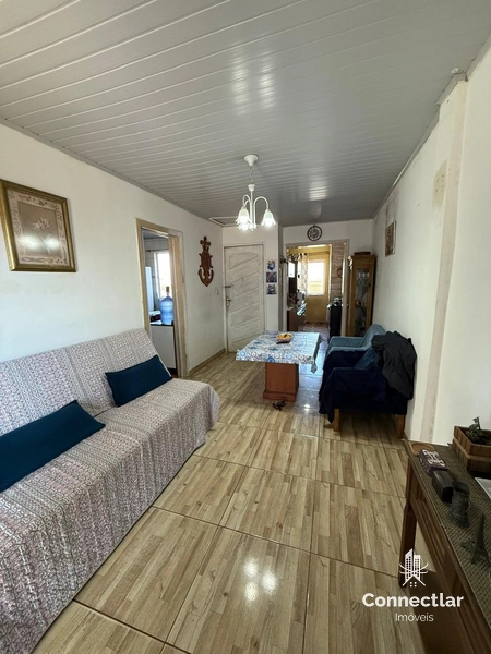 CASA AMPLA COM PARTE DA FRENTE PARA POSSÍVEL COMÉRCIO.: 2ª foto da galeria de imagens do imóvel