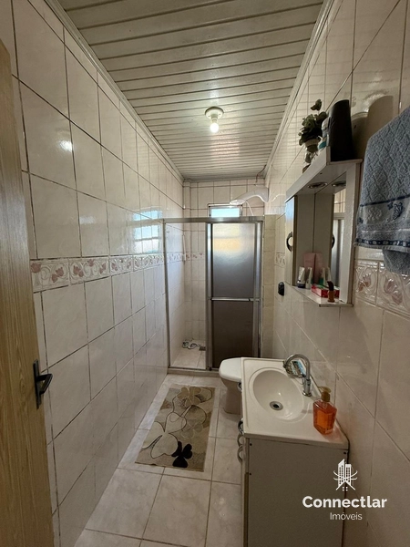CASA AMPLA COM PARTE DA FRENTE PARA POSSÍVEL COMÉRCIO.: 10ª foto da galeria de imagens do imóvel