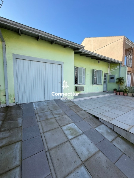 Ampla casa 3 dormitórios a meia quadra da Assis Brasil: 1ª foto da galeria de imagens do imóvel