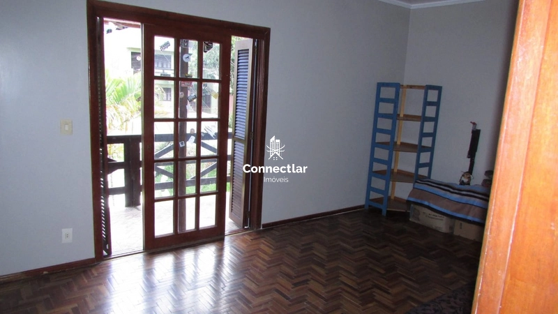 Casa ampla com 4 dormitórios, suíte e lindo pátio arborizado: 16ª foto da galeria de imagens do imóvel