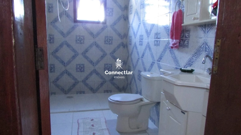 Casa ampla com 4 dormitórios, suíte e lindo pátio arborizado: 12ª foto da galeria de imagens do imóvel