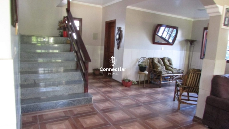 Casa ampla com 4 dormitórios, suíte e lindo pátio arborizado: 8ª foto da galeria de imagens do imóvel