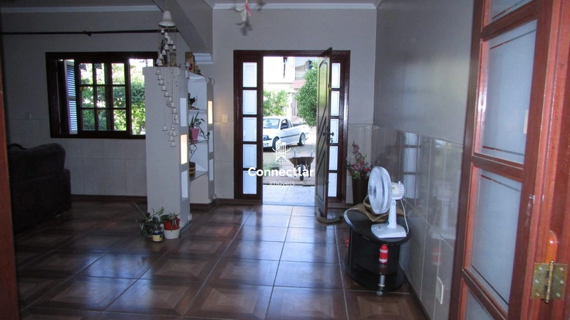 Casa ampla com 4 dormitórios, suíte e lindo pátio arborizado: 4ª foto da galeria de imagens do imóvel