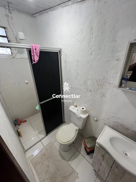 Casa com duas moradias em terreno amplo no Piratini: 26ª foto da galeria de imagens do imóvel