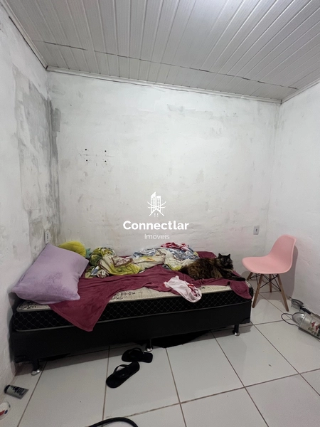 Casa com duas moradias em terreno amplo no Piratini: 24ª foto da galeria de imagens do imóvel