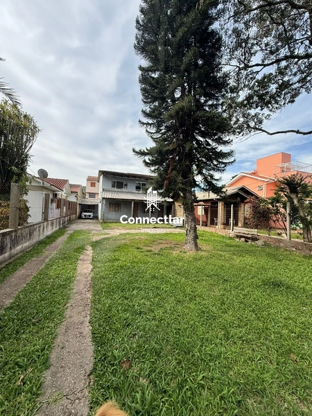 OPORTUNIDADE NO GUARUJÁ  Terreno com 3 residências no mesmo espaço: 2ª foto da galeria de imagens do imóvel