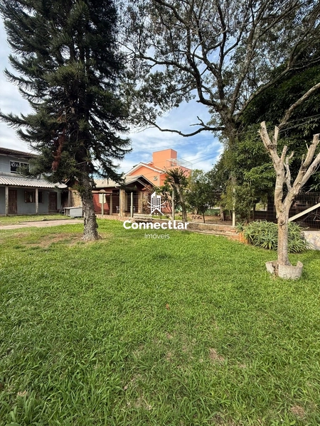 OPORTUNIDADE NO GUARUJÁ  Terreno com 3 residências no mesmo espaço: 1ª foto da galeria de imagens do imóvel