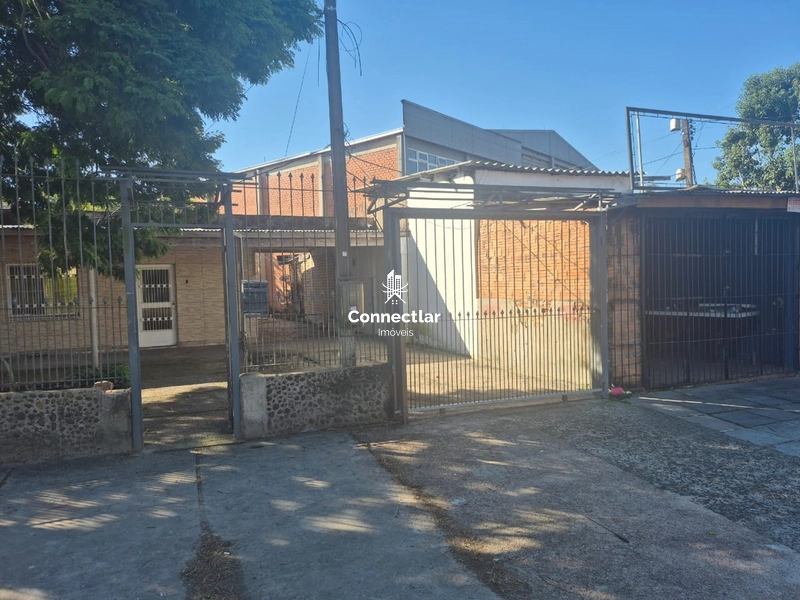 UMA CASA E DUAS LOJAS AO LADO NO BAIRRO PARTENON: 2ª foto da galeria de imagens do imóvel