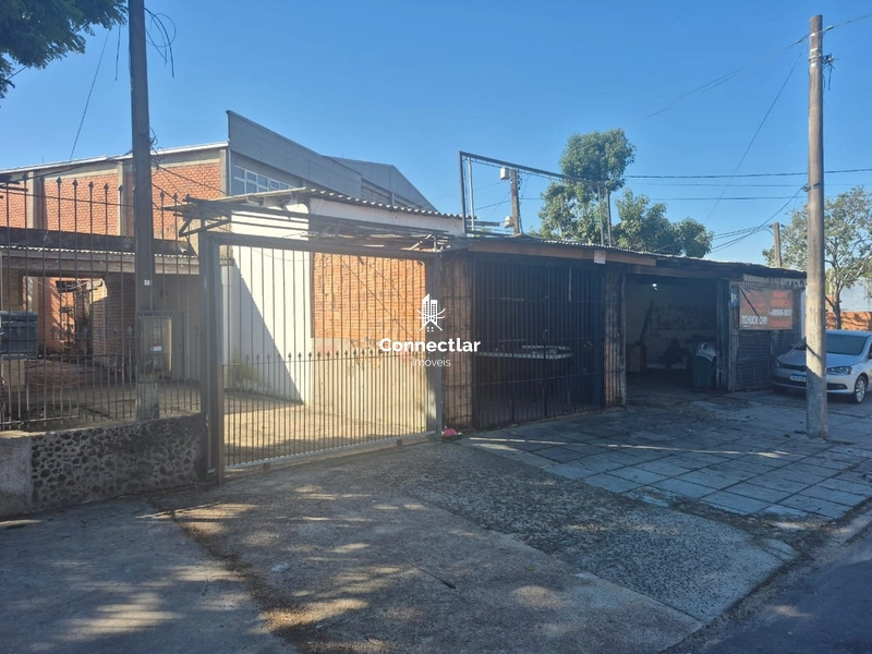 UMA CASA E DUAS LOJAS AO LADO NO BAIRRO PARTENON: 3ª foto da galeria de imagens do imóvel