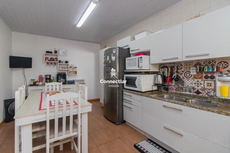 Casa de 2 dormitórios à venda no bairro Vila Nova, Porto Alegre!: 3ª foto da galeria de imagens do imóvel