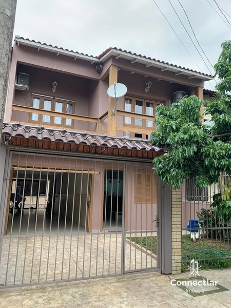 Dois sobrados em um terreno com área total 217m² em Alvorada: 1ª foto da galeria de imagens do imóvel