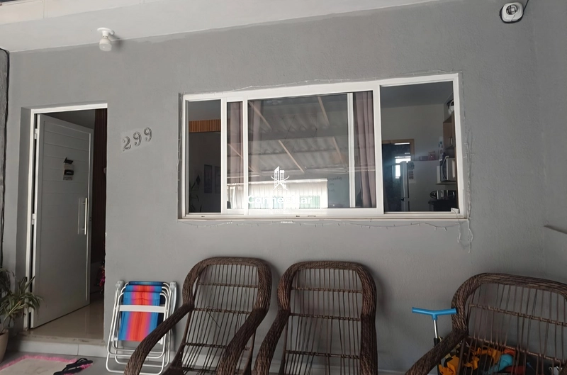 Casa 2 dormitórios vaga coberta: 1ª foto da galeria de imagens do imóvel