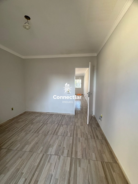 Apartamento de 1 Dormitório com Área Privativa e Vaga de Garagem: 2ª foto da galeria de imagens do imóvel