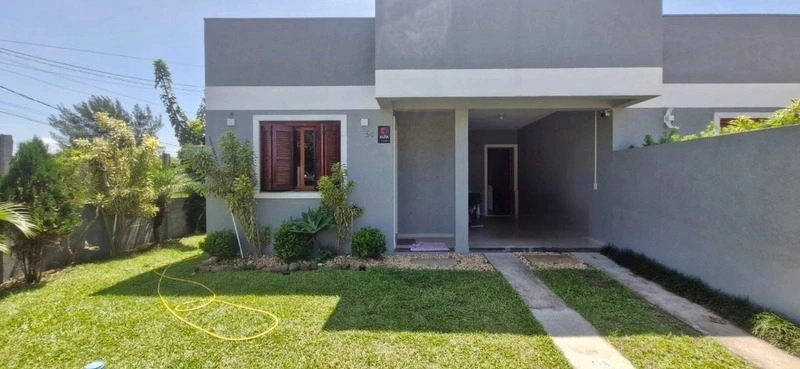 Casa de esquina a duas quadras do mar com 2 dormitórios: 4ª foto da galeria de imagens do imóvel