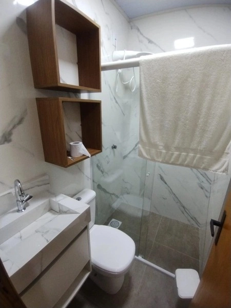 Casa com 3 dormitórios perto da praia e pátio amplo: 8ª foto da galeria de imagens do imóvel
