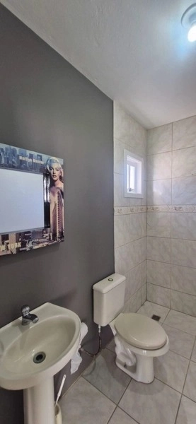 Casa de esquina com 3 dormitórios e área gourmet a 150m da praia: 13ª foto da galeria de imagens do imóvel