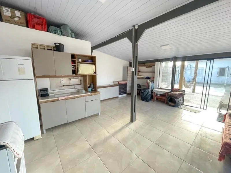 Casa a 150m da praia com 3 dormitórios: 6ª foto da galeria de imagens do imóvel