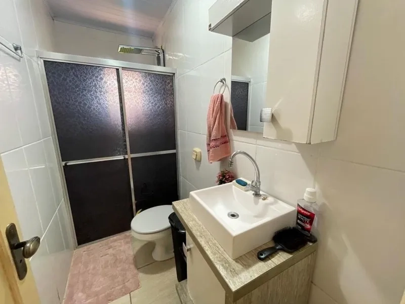 Casa a 150m da praia com 3 dormitórios: 5ª foto da galeria de imagens do imóvel