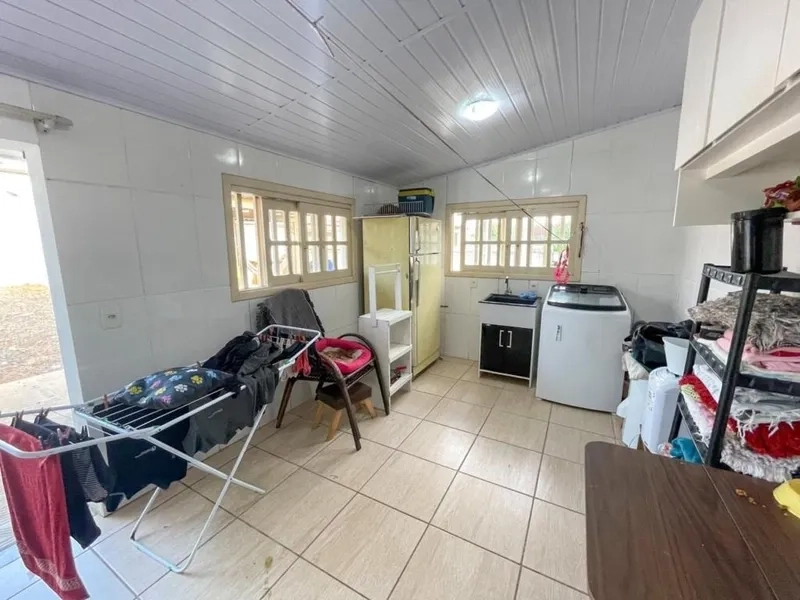 Casa a 150m da praia com 3 dormitórios: 9ª foto da galeria de imagens do imóvel