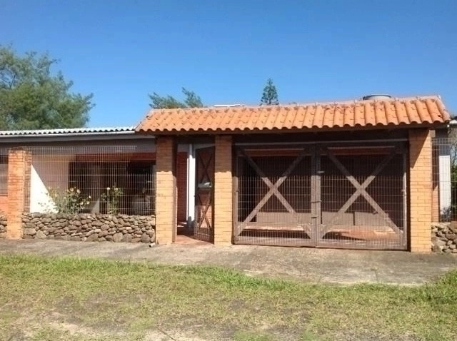 Excelente casa dois terrenos junto ao mar em Capão da Canoa: 1ª foto da galeria de imagens do imóvel