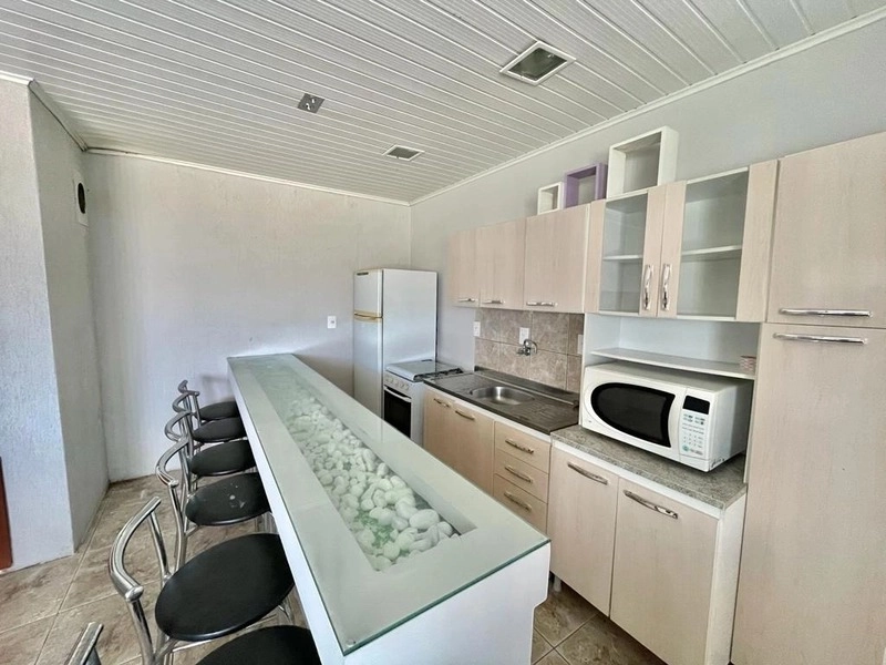 Casa com 3 dormitórios e anexo nos fundos no bairro Zona Nova: 7ª foto da galeria de imagens do imóvel