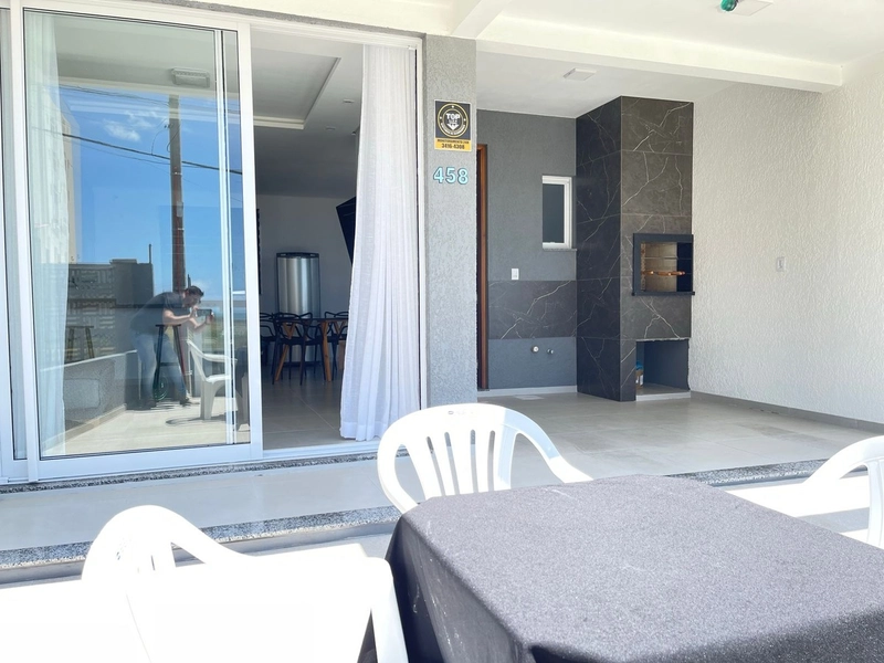 Sobrado com 2 dormitórios mobiliado e sacada com vista para o mar: 4ª foto da galeria de imagens do imóvel