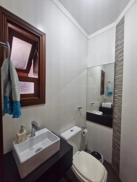 Casa a uma quadra do mar com 4 dormitórios: 22ª foto da galeria de imagens do imóvel