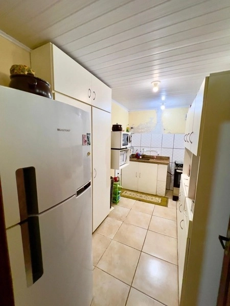 Casa com 2 dormitórios e pátio enorme no bairro Araça: 10ª foto da galeria de imagens do imóvel