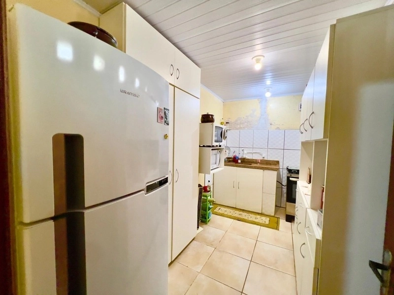Casa com 2 dormitórios e pátio enorme no bairro Araça: 8ª foto da galeria de imagens do imóvel