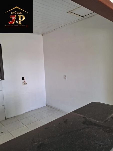 Casa no centro com 2 dormitórios e grande pátio: 10ª foto da galeria de imagens do imóvel