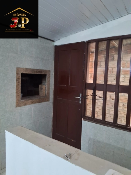 Casa no centro com 2 dormitórios e grande pátio: 15ª foto da galeria de imagens do imóvel