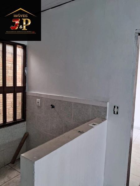 Casa no centro com 2 dormitórios e grande pátio: 9ª foto da galeria de imagens do imóvel