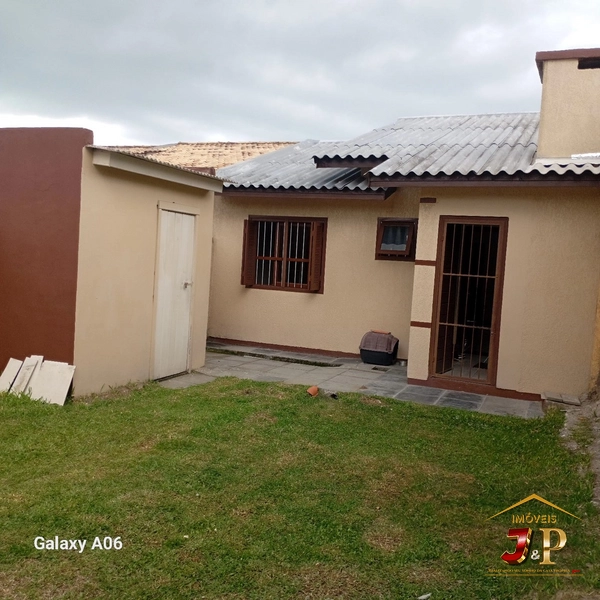 A casa 2 dormitórios lado mar por apenas 260 mil: 2ª foto da galeria de imagens do imóvel