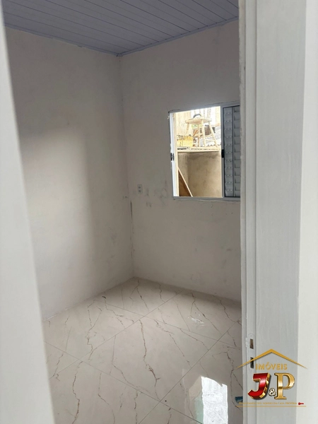 Casa com 2 dormitórios no Centro: 2ª foto da galeria de imagens do imóvel