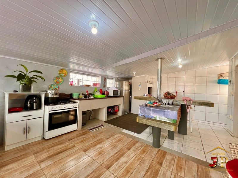 Linda casa bem localizada com 2 dormitórios e piscina: 9ª foto da galeria de imagens do imóvel