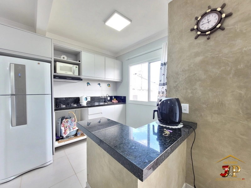 Casa com 2 dormitórios a alguns passos do mar: 7ª foto da galeria de imagens do imóvel