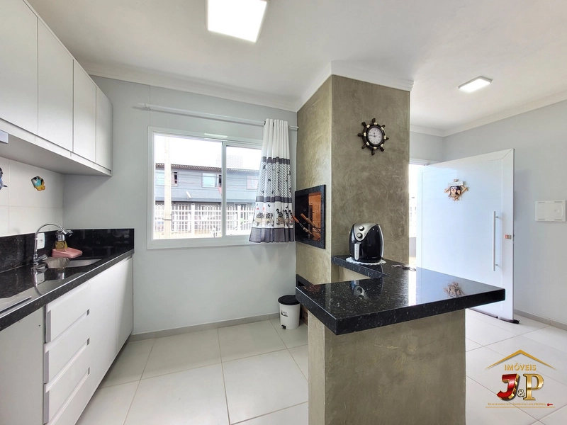 Casa com 2 dormitórios a alguns passos do mar: 11ª foto da galeria de imagens do imóvel