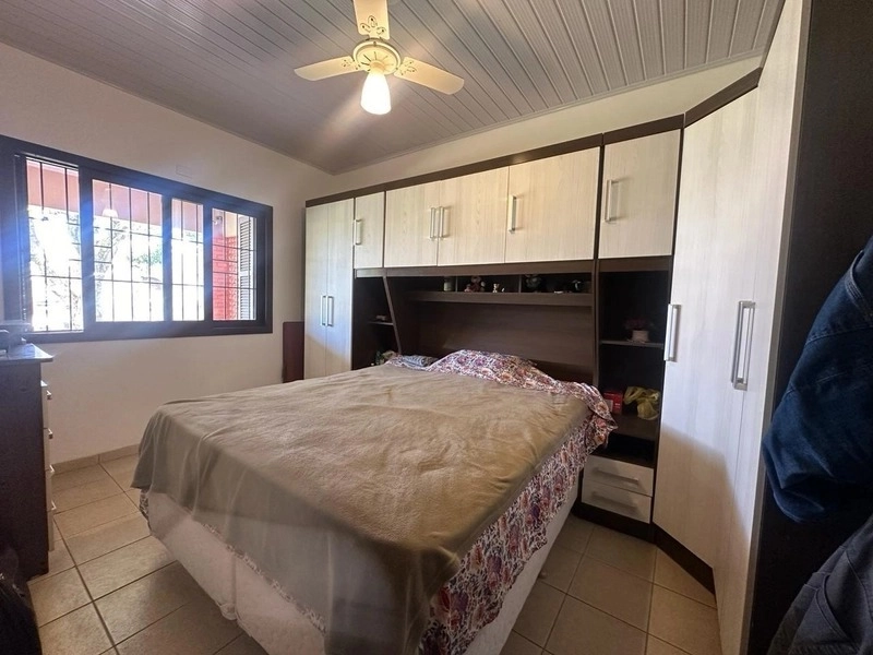 Casa com 3 dormitórios e 3 terrenos, a poucos passos do mar: 2ª foto da galeria de imagens do imóvel