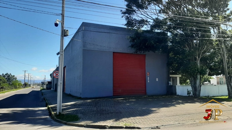 Pavilhão industrial de frente para a avenida: 1ª foto da galeria de imagens do imóvel